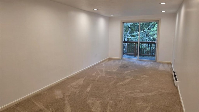 17 Crowningshield Dr, Paxton, MA 01612 - carpeted empty room featuring recessed lighting and a baseboard heating unit