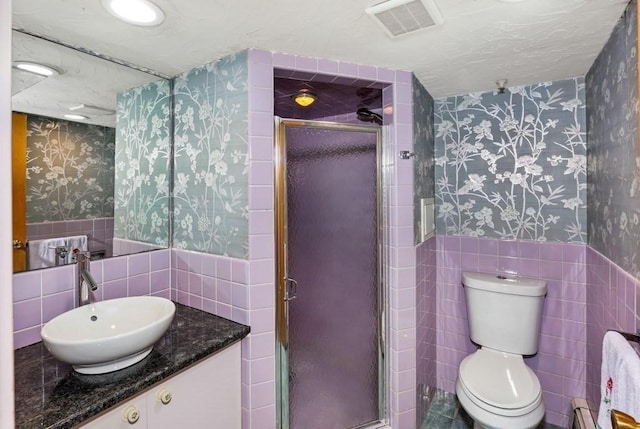 17 Crowningshield Dr, Paxton, MA 01612 - full bath with wallpapered walls, tile walls, vanity, a shower stall, and a wainscoted wall