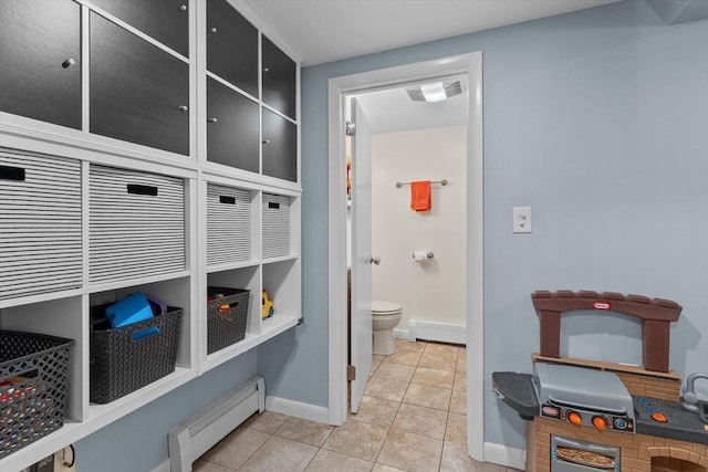 87 Lockwood Rd, Lynn, MA 01904 - mudroom featuring a baseboard heating unit, baseboards, and tile patterned flooring