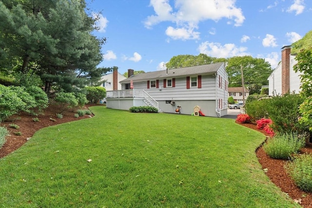 87 Lockwood Rd, Lynn, MA 01904 - rear view of property with a yard and stairs