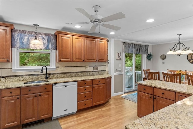 87 Lockwood Rd, Lynn, MA 01904 - kitchen featuring dishwasher, a sink, light wood finished floors, brown cabinets, and ornamental molding