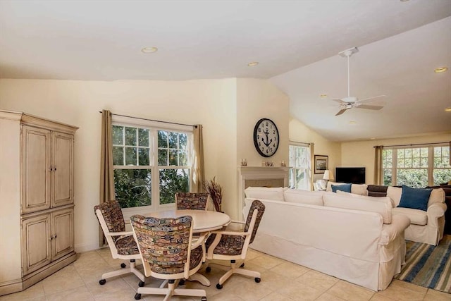 dining area featuring light tile patterned floors, vaulted ceiling, a ceiling fan, and recessed lighting