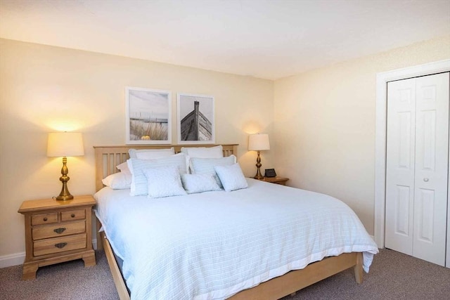 carpeted bedroom with a closet