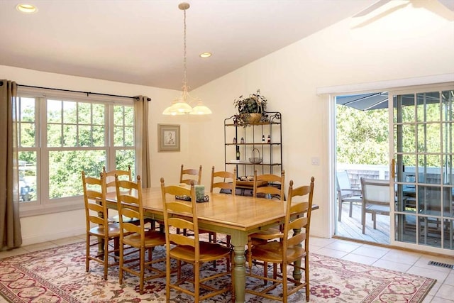 dining area featuring vaulted ceiling, light tile patterned flooring, visible vents, and recessed lighting