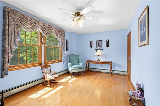 27 Crestview Dr, Uxbridge, MA 01569 - sitting room featuring baseboard heating, hardwood / wood-style floors, and ceiling fan