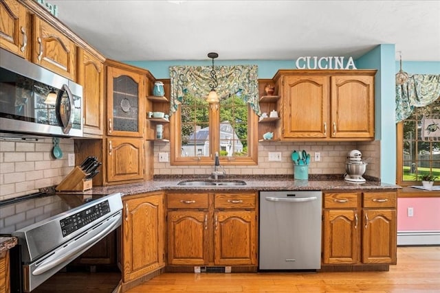 27 Crestview Dr, Uxbridge, MA 01569 - kitchen with appliances with stainless steel finishes, open shelves, a sink, and light wood-style floors
