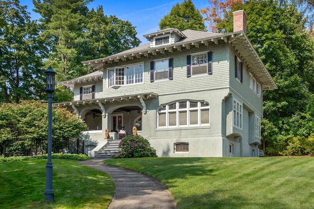 italianate home with a front yard