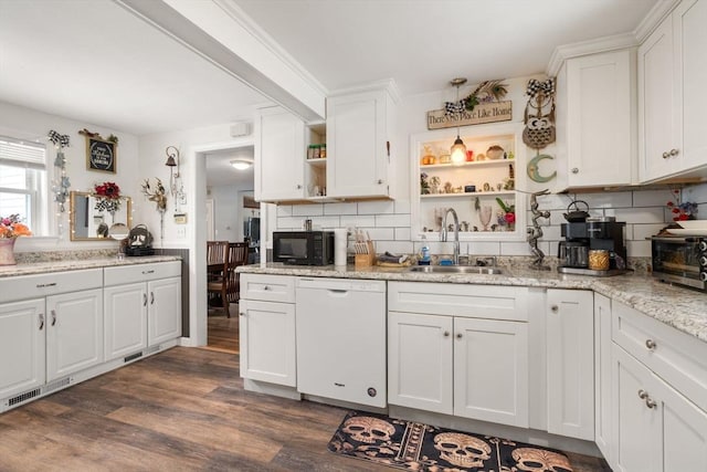 kitchen with white cabinetry, white dishwasher, a sink, and open shelves