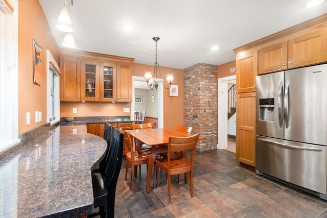 36 Blake Rd, Brookline, MA 02445 - dining area featuring a chandelier, stone finish floor, and recessed lighting