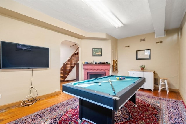 36 Blake Rd, Brookline, MA 02445 - playroom featuring baseboards, visible vents, and wood finished floors
