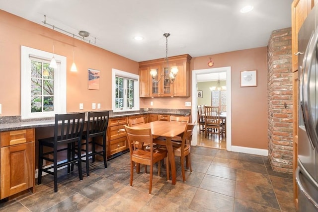 36 Blake Rd, Brookline, MA 02445 - dining space featuring baseboards, a wealth of natural light, a chandelier, and recessed lighting
