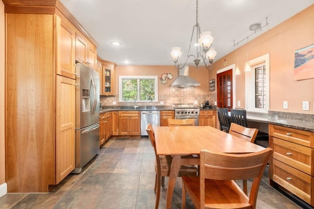 36 Blake Rd, Brookline, MA 02445 - dining space featuring a notable chandelier