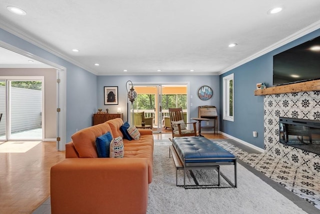 31 Monadnock Dr Unit 31, Westford, MA 01886 - living room featuring recessed lighting, baseboards, a fireplace, and ornamental molding