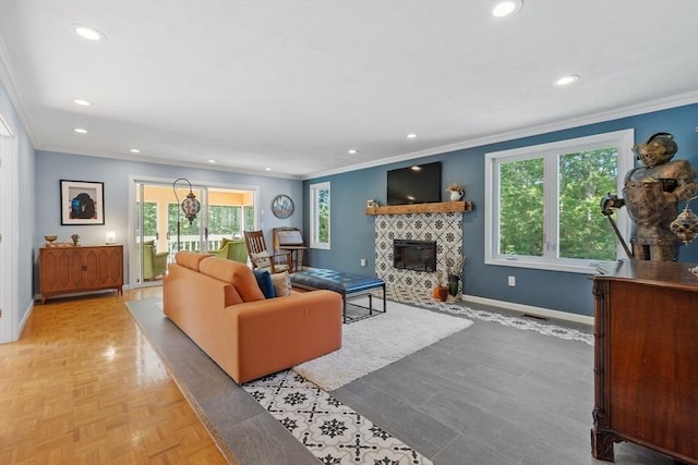 31 Monadnock Dr Unit 31, Westford, MA 01886 - living room featuring ornamental molding, a fireplace, baseboards, and recessed lighting