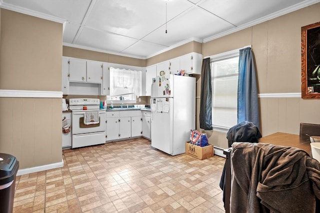 kitchen with white appliances, white cabinetry, plenty of natural light, and sink