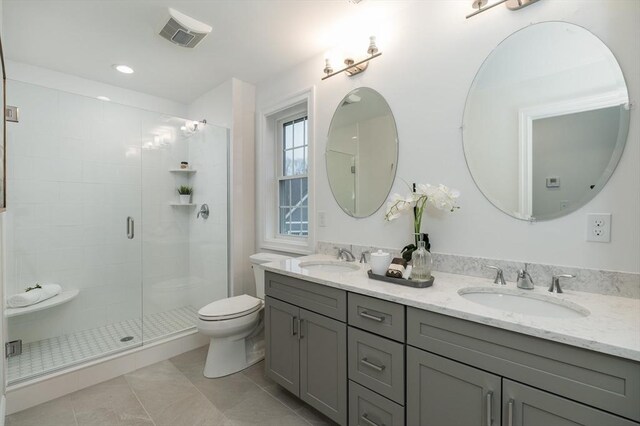 62 High St Lot 3, Stoneham, MA 02180 - full bath featuring double vanity, a stall shower, toilet, and tile patterned floors