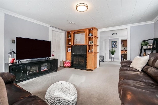 carpeted living area featuring a fireplace with flush hearth and crown molding