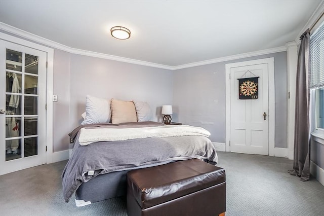 carpeted bedroom with baseboards and ornamental molding