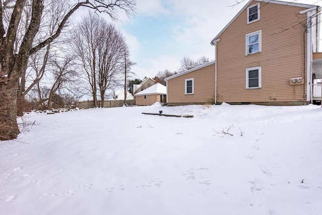 view of snow covered house