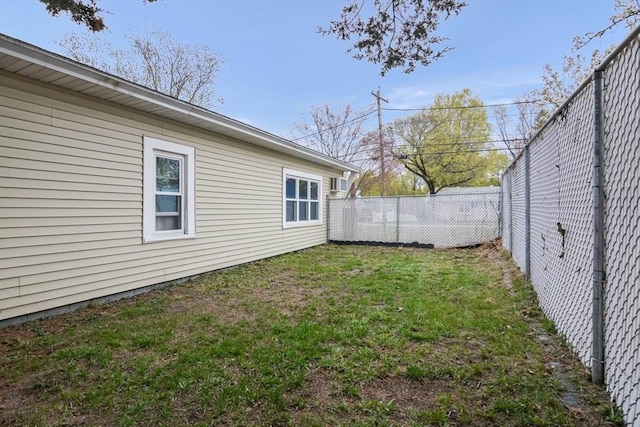 view of yard with a fenced backyard
