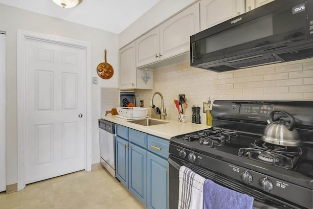 kitchen featuring blue cabinets, sink, white cabinetry, black appliances, and backsplash