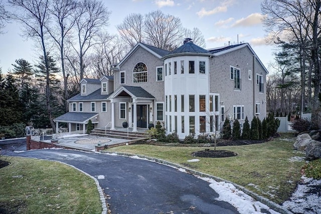 view of front of home with a front yard