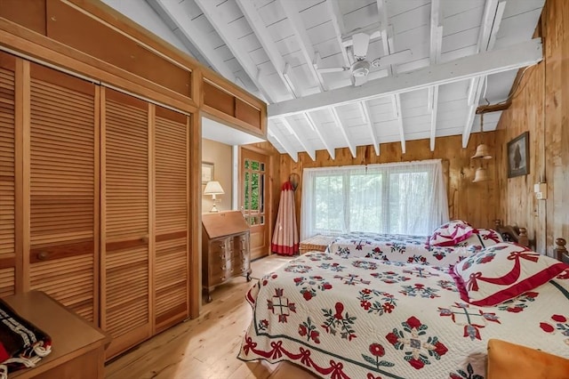32 Pond Hill Rd, Goshen, MA 01032 - bedroom featuring light wood-style flooring, wood walls, and a closet