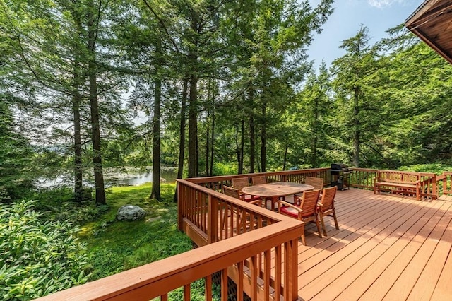 32 Pond Hill Rd, Goshen, MA 01032 - wooden deck featuring outdoor dining space and a water view