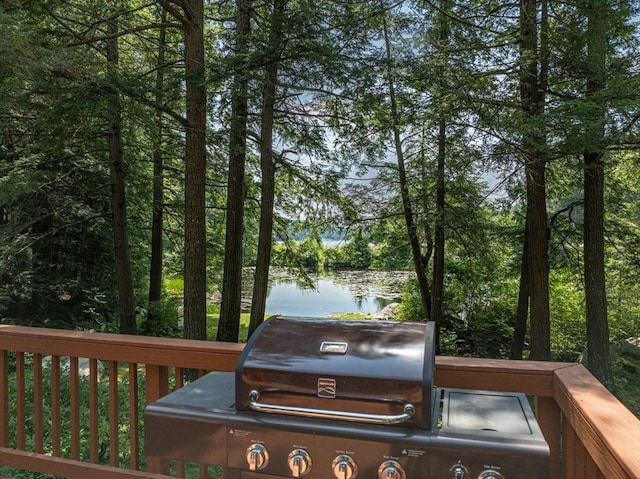 32 Pond Hill Rd, Goshen, MA 01032 - wooden terrace with a water view and grilling area