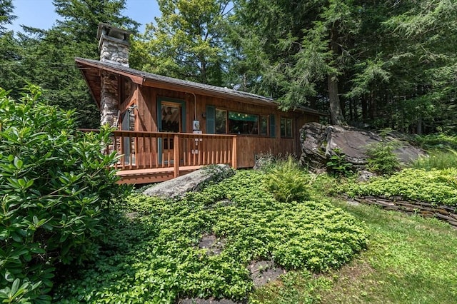 32 Pond Hill Rd, Goshen, MA 01032 - back of house with a chimney