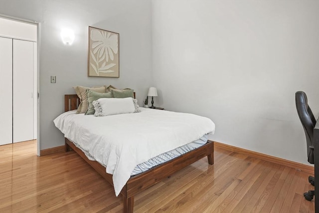 147 Butternut Holw Unit 147, Acton, MA 01718 - bedroom with baseboards and light wood-type flooring