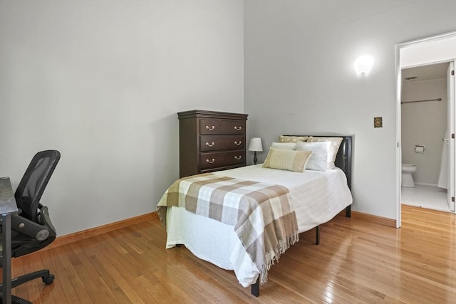 147 Butternut Holw Unit 147, Acton, MA 01718 - bedroom featuring light wood-style floors, baseboards, and a desk