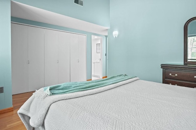 147 Butternut Holw Unit 147, Acton, MA 01718 - bedroom featuring a closet and wood finished floors
