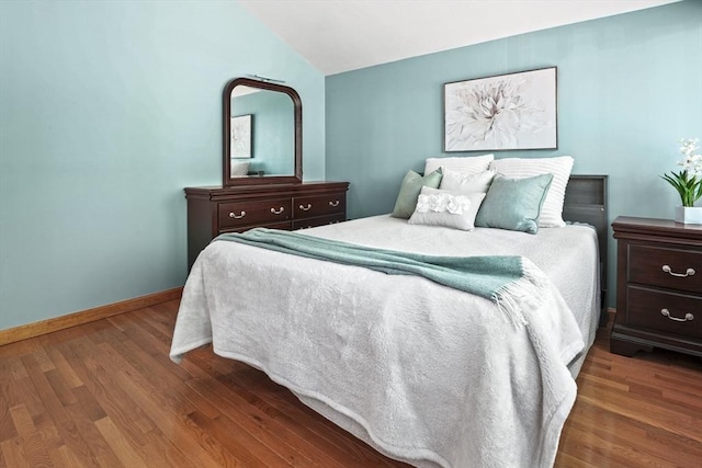 147 Butternut Holw Unit 147, Acton, MA 01718 - bedroom with vaulted ceiling, wood finished floors, and baseboards