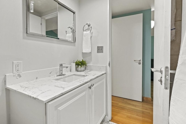 147 Butternut Holw Unit 147, Acton, MA 01718 - bathroom featuring wood finished floors and vanity