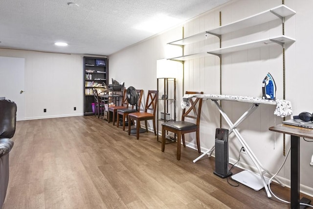 147 Butternut Holw Unit 147, Acton, MA 01718 - miscellaneous room featuring wood finished floors, a textured ceiling, and baseboards