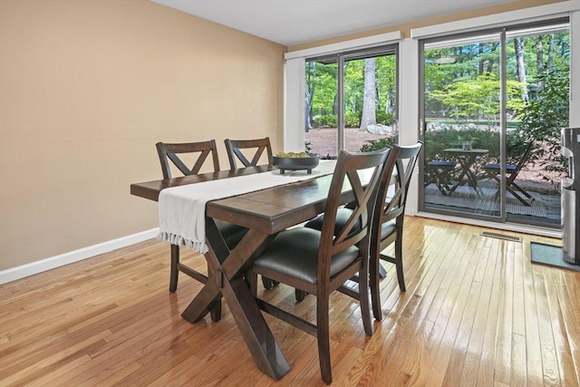 147 Butternut Holw Unit 147, Acton, MA 01718 - dining space with light wood finished floors and baseboards