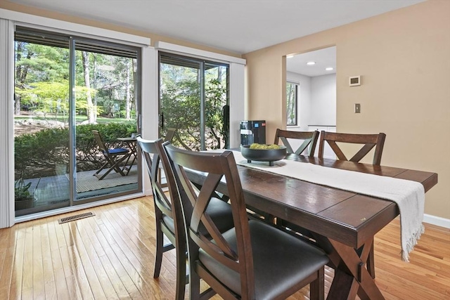 147 Butternut Holw Unit 147, Acton, MA 01718 - dining area with light wood finished floors and baseboards