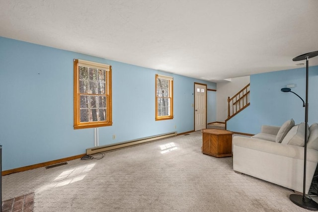 130 Surrey Ln, Brewster, MA 02631 - living room with a baseboard radiator, stairway, visible vents, and carpet floors