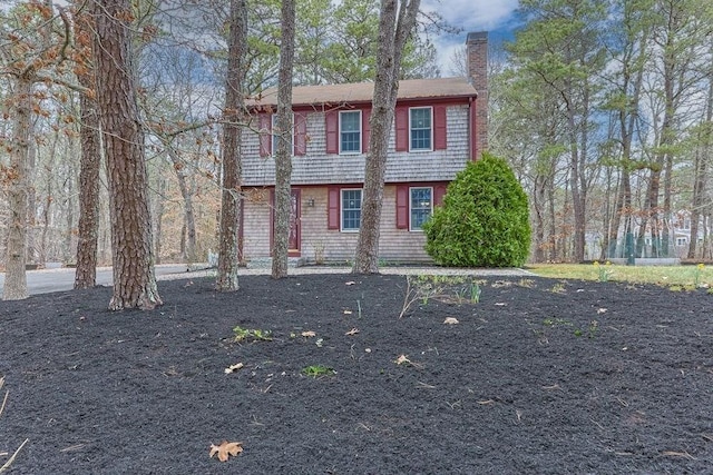 130 Surrey Ln, Brewster, MA 02631 - colonial home featuring a chimney