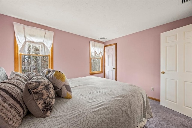 130 Surrey Ln, Brewster, MA 02631 - bedroom featuring visible vents, carpet flooring, and baseboards