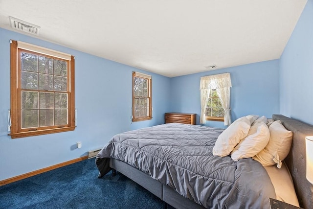 130 Surrey Ln, Brewster, MA 02631 - carpeted bedroom featuring baseboards, visible vents, and a baseboard radiator