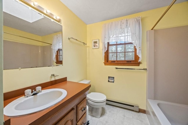 130 Surrey Ln, Brewster, MA 02631 - full bath featuring a baseboard radiator, toilet, and vanity