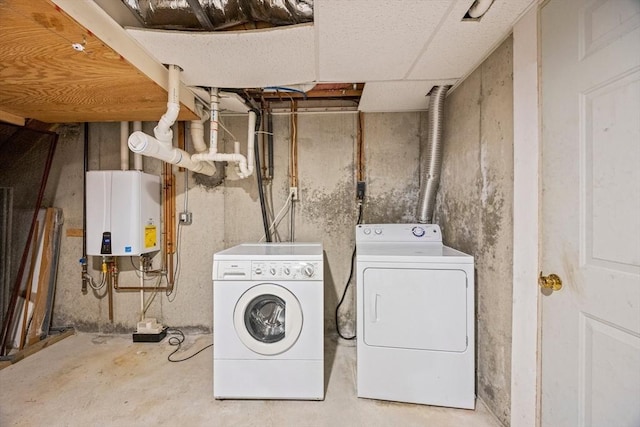 130 Surrey Ln, Brewster, MA 02631 - laundry room featuring tankless water heater, independent washer and dryer, and laundry area