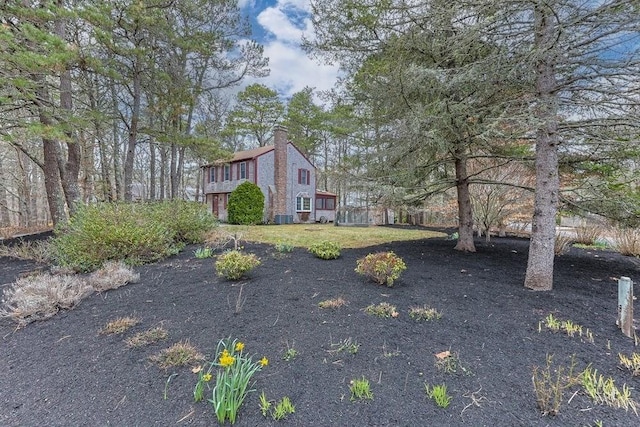 130 Surrey Ln, Brewster, MA 02631 - exterior space featuring a chimney