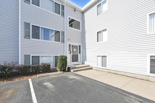 219 Glasgow St Unit 2, Fall River, MA 02721 - view of exterior entry featuring uncovered parking