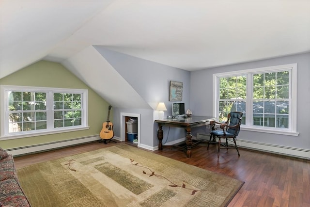 home office with dark hardwood / wood-style floors, vaulted ceiling, and baseboard heating