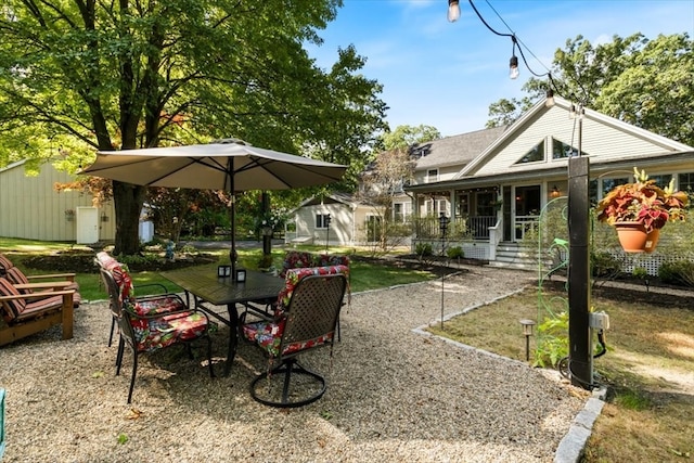 view of patio with an outdoor structure