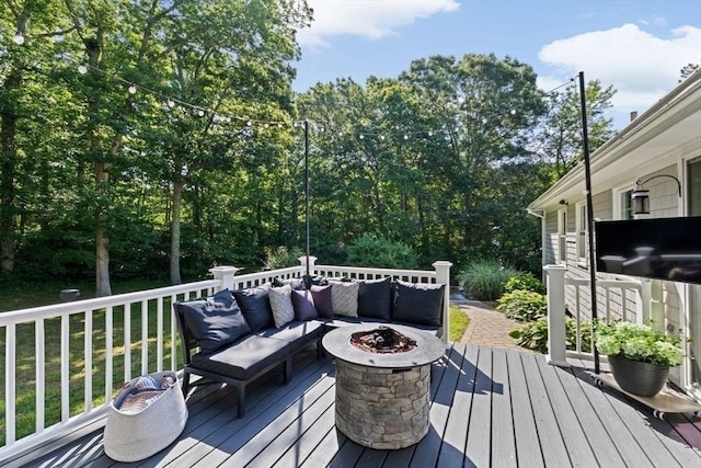 15 Surrey Ln, Sandwich, MA 02563 - wooden deck featuring an outdoor living space with a fire pit