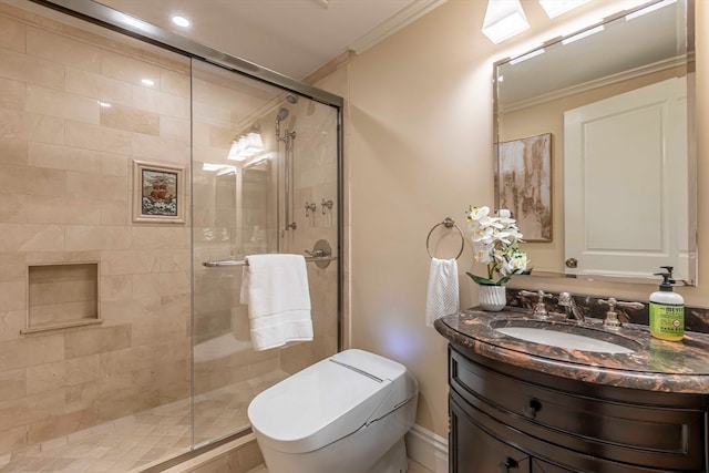 bathroom featuring vanity, crown molding, toilet, and a shower with door